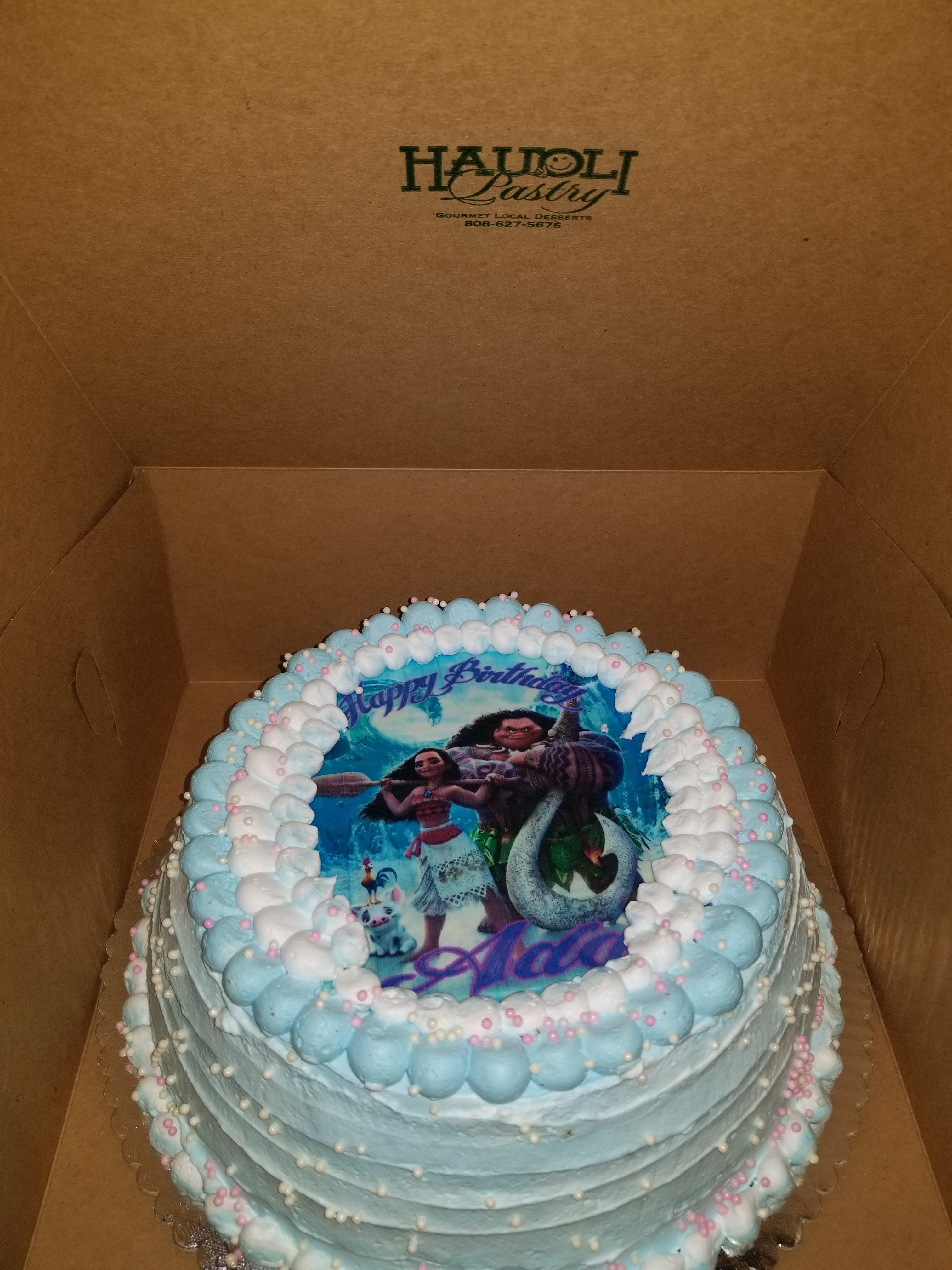 Hau'oli Buttercake with whipped cream frosting and strawberries